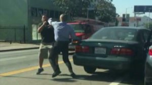 Still from the video footage which caught the recent road rage fight between to men.
